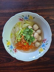 White rice vermicelli with pork meatballs in clear soup,  pork noodle soup