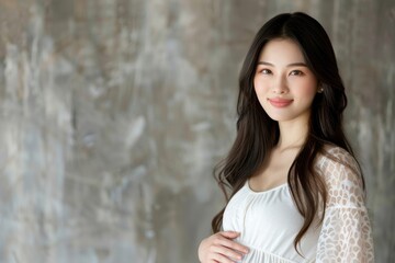 Obraz premium Woman is posing for a picture in a white dress