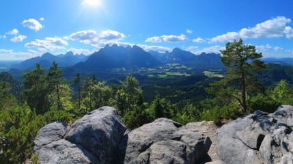 Obraz premium Stunning panoramic view of northern german mountains with sunlight and vibrant alpine scenery