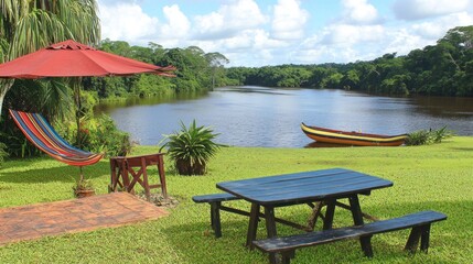 Obraz premium Relaxing hammock by jungle river, picnic table