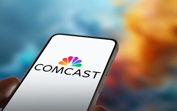 Comcast Corporation logo displayed on smartphone