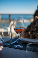 Glass of rosé wine on a rooftop
