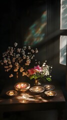 Elegant Floral Arrangement with Diyas and Oil Lamps in Soft Light