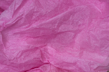 Fototapeta premium Recycling pink crumpled paper background.