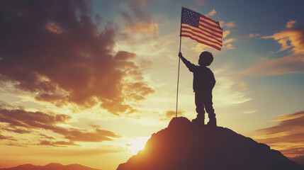Child holding american flag at sunset mountain peak inspirational image natural landscape low angle view patriotism and freedom symbolism