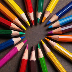 Naklejka premium Colorful Pencils Arranged in a Circle on a Table