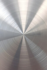 Obraz premium Brushed shiny silver metal texture circular stainless steel background.