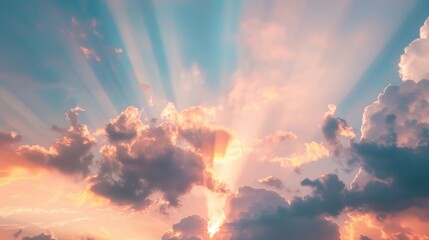 Fototapeta premium Sunset with vibrant clouds and rays illuminating the sky above a serene landscape