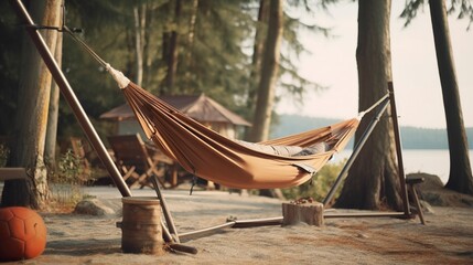 A photo of a portable hammock stand set up at a camps