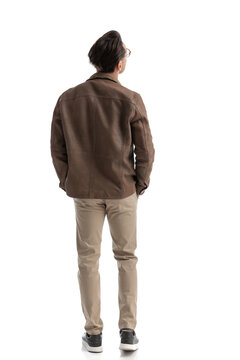behind of smart casual man looking up to side