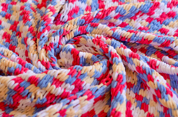 Soft and Vibrant Knitted Fabric Close-Up Cozy Textures in ColorA detailed close-up of a soft and...