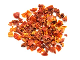 Delicious portion of dried tomatoes on a bright background.