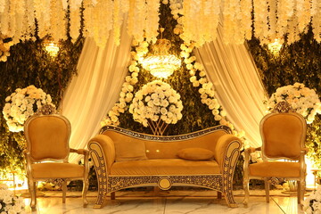 Beautiful wedding stage decorated with flowers, Wedding ceremony and decorations Stage for couple , wedding Event, Decor Concept, Engagement Decor	