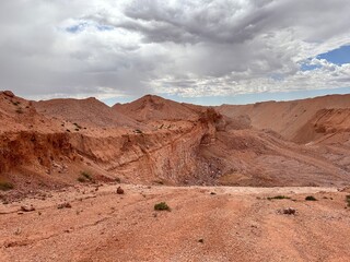 Coober Pedy, in South Australia, is the opal capital of the world, famous for its underground homes, churches, and shops built to escape the desert heat, offering a unique outback experience.