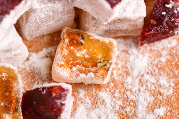 Sweet food Turkish delight, assorted rahat locum in form of cubes with nuts and powdered sugar, traditional food