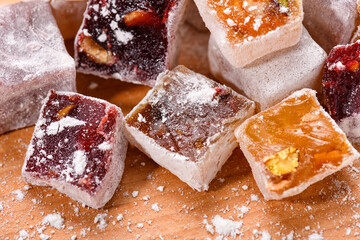 Sweet food Turkish delight, assorted rahat locum in form of cubes with nuts and powdered sugar, traditional food