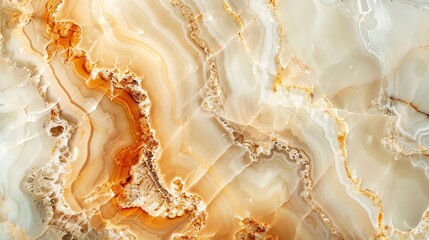 A close-up of a marble surface with shades of beige, white and orange.