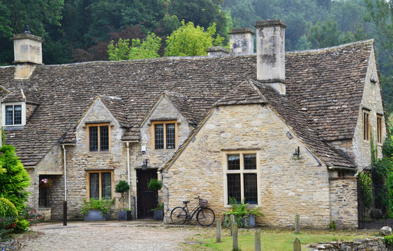 Close-up of a house near the Brook, Castle Combe village, Cotswolds, Wiltshire, England, United Kingdom