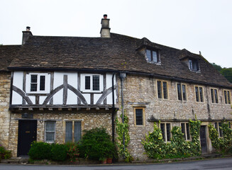 An old fachwerk house in the Castle Combe village, Cotswold, Wiltshire, UK