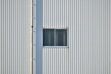 Architecture with one drainage pipe and one window.