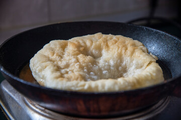 Dough pies on the table