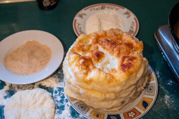 Dough pies on the table