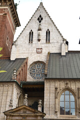 Beautiful Krakow market square. Faded colors. Vintage elegant carriages with beautifully dressed horses ride people around the historic center of Krakow on the old streets of Europe High quality photo