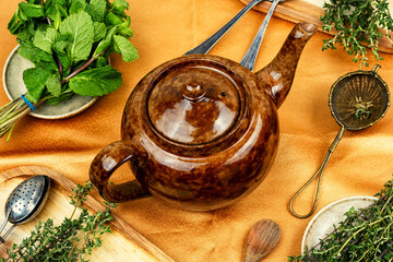Teapot with herbal tea.