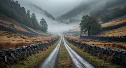 Rustic medieval road leading through a foggy valley