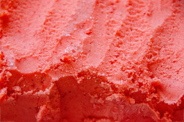 Raspberry sorbet texture, top view. Strawberry ice-cream pattern or texture. Texture surface of ice cream. Background of strawberry ice cream close-up. Banner. High quality photo