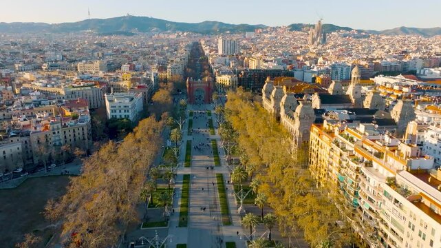 Barcelona aerial view at sunset, drone view of avenue of the Arch of Triumph in Barcelona, tourism in Catalunya, Barcelona