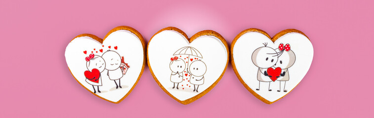 Gingerbread cookies for Valentine's Day on a pink background, sweet Valentine's Day gift, cookies with cream and icing