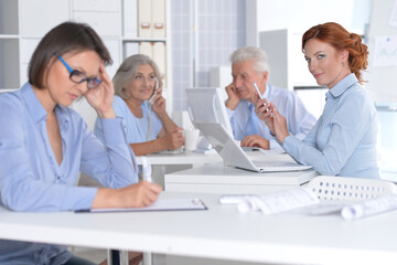 business people working at desk in office