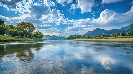 Tranquil River Scene with Lush Greenery and Stunning Sky Reflections, showing peace