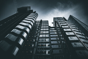 The famous Lloyds building in London with dark sky