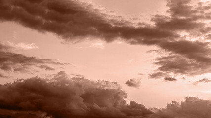 Sky with brown-tinted clouds in mocha-mousse tones, creating a dramatic and unique atmospheric effect.