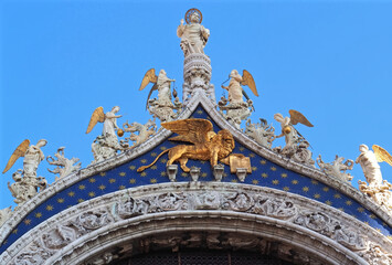 Sculptures on the facade of basilica di san marco or st. marks church in Venice Italy