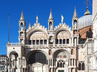 Fototapeta premium Sculptures on the facade of basilica di san marco or st. marks church in Venice Italy
