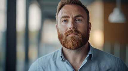 Obraz premium Close-up Portrait of a Thoughtful Man with a Red Beard