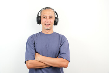 Adult Asian Man Enjoying Music with Headphones
