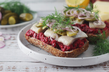 Scandinavian sandwiches with herring and beetroot