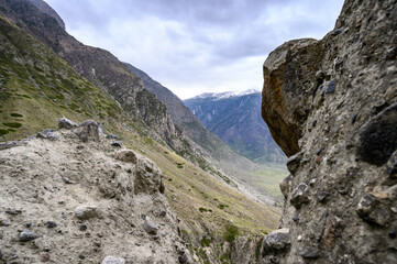 Stone mushrooms. Stone formations on the slope of a high mountain. Altai.