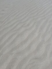 Lancelin, a coastal town in Western Australia, is famous for its white sand dunes, perfect for sandboarding, off-road adventures, pristine beaches, windsurfing, and a relaxed atmosphere.