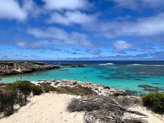 
Rottnest Island, near Perth, offers crystal-clear waters perfect for swimming, snorkeling, and diving. Its pristine beaches, marine life, and friendly quokkas make it a paradise for visitors.