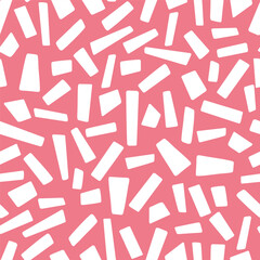 Irregular white geometric shapes scattered across a vibrant pink background