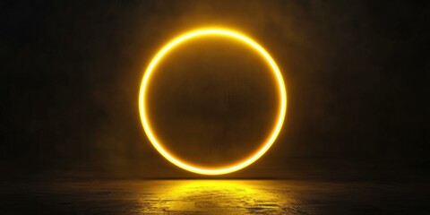 A thick neon circle glowing in radiant yellow, casting a faint light on a sleek black background