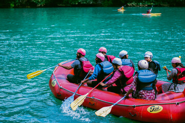 Dandeli, Karnataka- 6th december 2024-Young Indian tourists are rafting on the river in Dandeli, India.