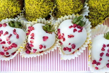 Strawberries in white and brown chocolate.