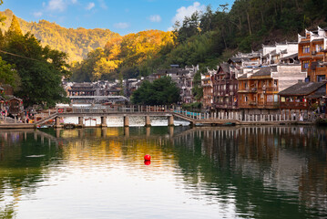 Obraz premium Fenghuang ancient town, Chhina. Traditional chinese wooden houses in old watertown