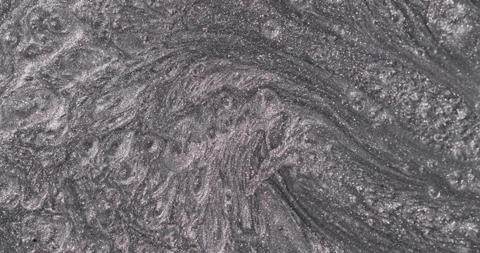 cool silver texture looking like the landscape of a distant grey planet
